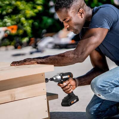 Using_a_cordless_drill_outside